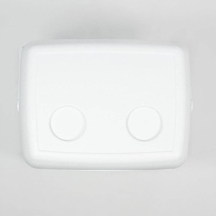 A white rectangular cooler or storage container with rounded corners and two circular indentations on the lid, photographed from above on a light gray background.