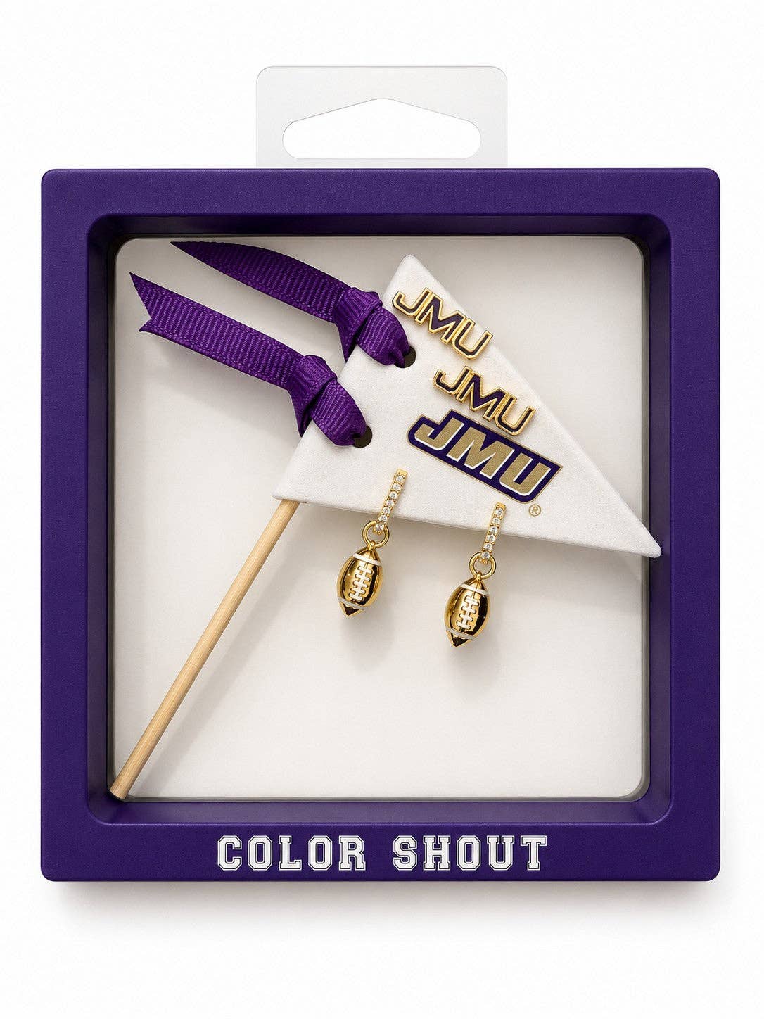 A JMU 'Color Shout' themed jewelry gift set in a purple window box. The set includes a small white pennant flag with gold and purple JMU lettering, a matching purple ribbon, and two gold football-shaped dangling earrings.
