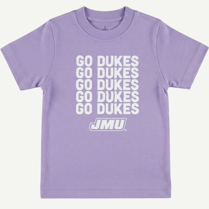 A light purple short-sleeve t-shirt with 'GO DUKES' printed in white stacked vertically on the front, with the JMU logo underneath, shown against a light off-white background.