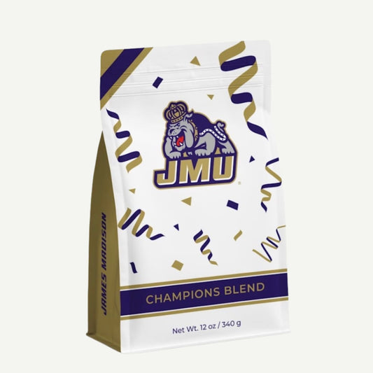 Coffee bag with JMU logo and 'Champions Blend' text on a white background