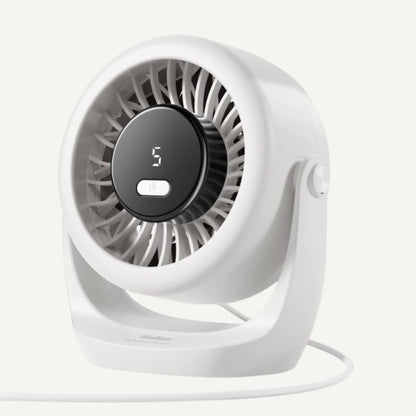 A compact white desk fan with a circular black control panel displaying '3' and a white cord, photographed on a clean off-white background.